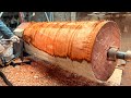 Highly Skilled Wood Turners Create Water Hyacinths From Large Tree Trunks