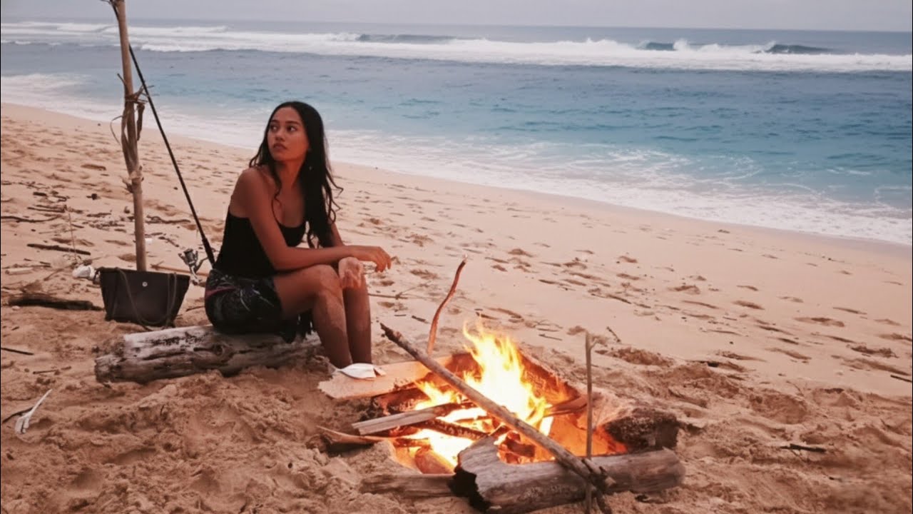fishing for dinner & cooked it on the BEACH