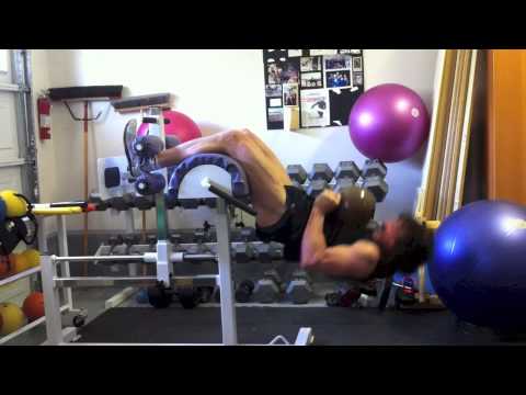 Strength training of the hip flexors and trunk using a glute-ham bench
