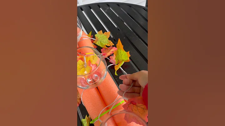 she transformed a pool noodle into a fall centerpiece #diy #autumn #easyhomedecor