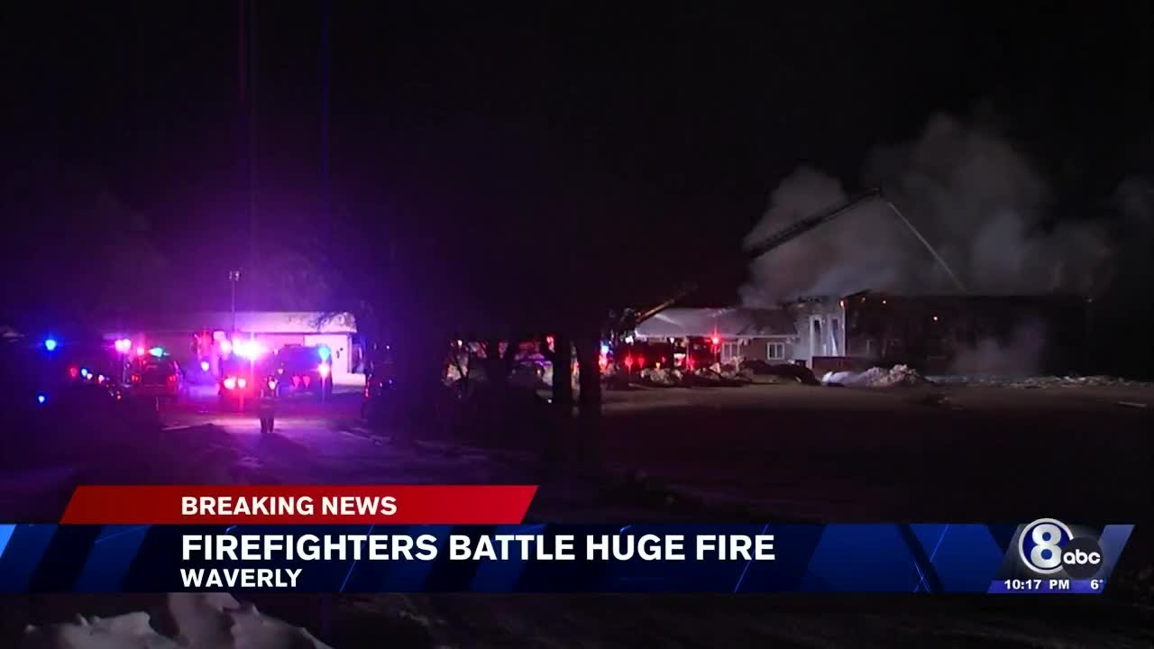Firefighters battle blaze at business near Waverly - YouTube