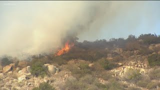 Firefighters working on  San Marcos 'Comet' fire