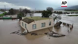 California farm fields submerged by flooding