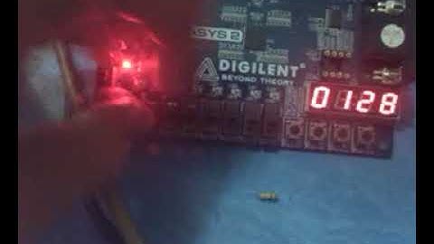 Binary to 7 segment decoder using FPGA Basys2 board