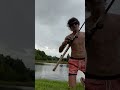 Scary alligator creeps up behind Florida man showing off his catch