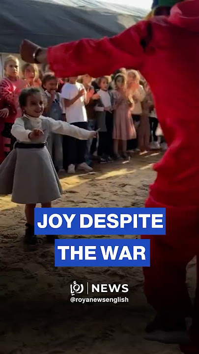 A child in Gaza steals moments of joy as war rages around her