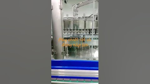 Máy chiết rót và đóng nắp lon