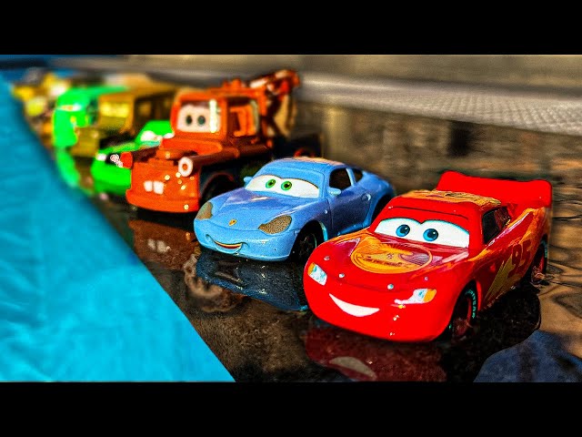 Looking for Disney Pixar Cars On the Rocky Road : Lightning McQueen, Mater, Dinoco McQueen, Mack class=