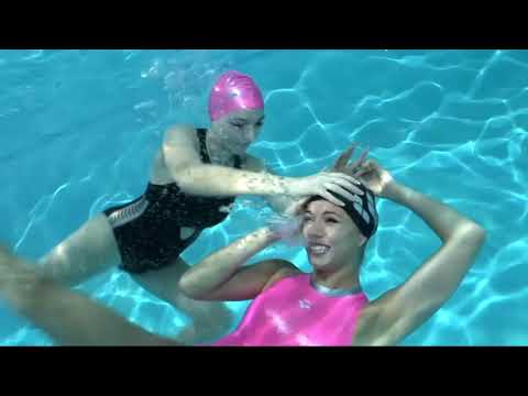 Two sexy girls wrestling underwater