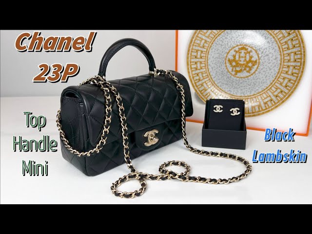 Chanel 23P Black Lambskin Top Handle Mini with Champagne Gold Hardware. 
