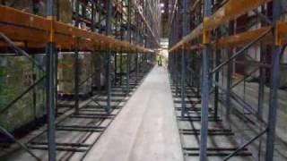 Dexion 14 metre pallet racking installation with anti-collapse mesh between bays