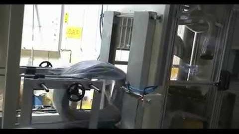 Auto hose and pipe coil shrink wrapping machine