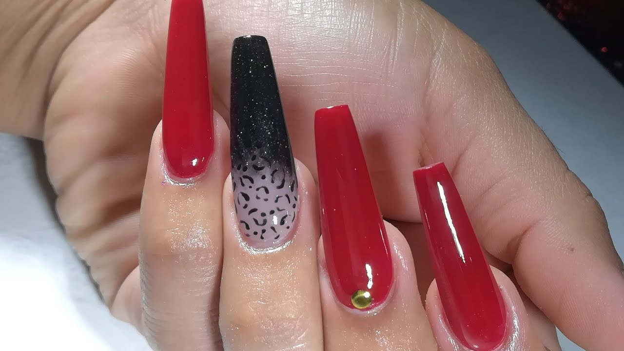 Uñas rojas con animal print en punta confín 💅 - thptnganamst.edu.vn