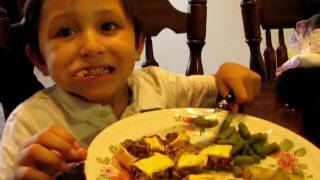 Kid eating jalapenos