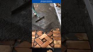 Filling The Gaps In The Brick Floor With A Mixture Of Cement And Sand
