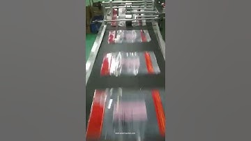 High speed empty flat plastic bag paging feeding machine with conveyor