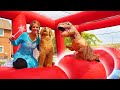 Frozen Elsa Surprises Sammie With Wipeout Bounce House!