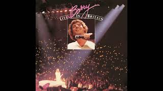 Watch Barry Manilow Break Down The Door video