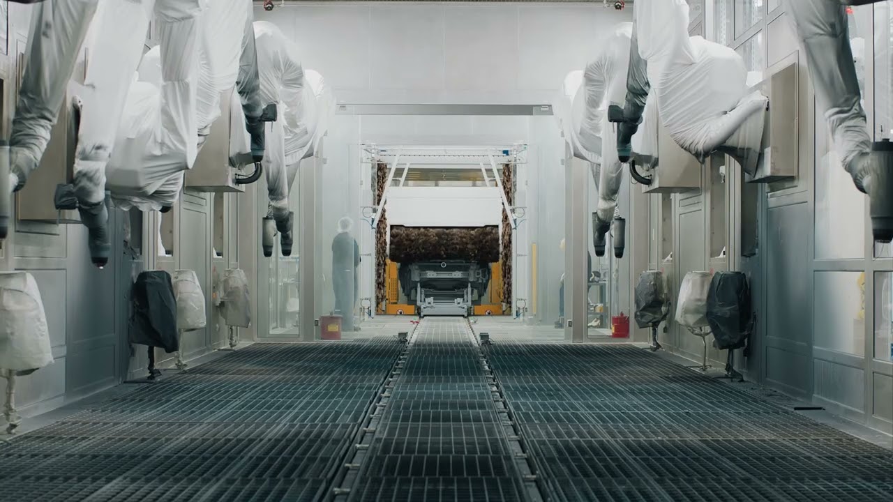 Rivian partners with Kawasaki Robotics to build EV manufacturing plant – Video