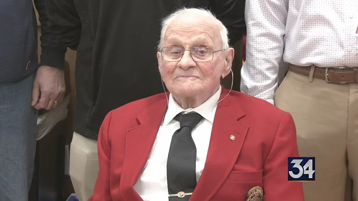 Funeral home celebrates local veteran's 100th birthday with donation to resource center