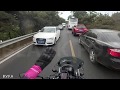 Civilian motorcycle helping ambulance  ambulance escort in traffic jam