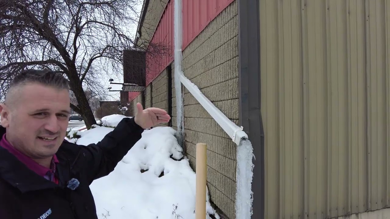 Commercial Mold Inspection: Ice Damming & Frozen Gutters Causing Water Intrusion. Enviro-Decon