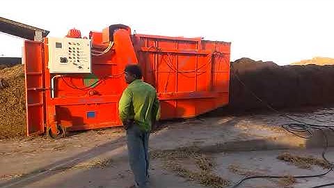 MUSHROOM COMPOST TURNER WITH WATERING ARRANGEMENT