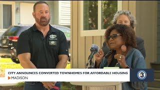 City announces converted townhomes for affordable housing.