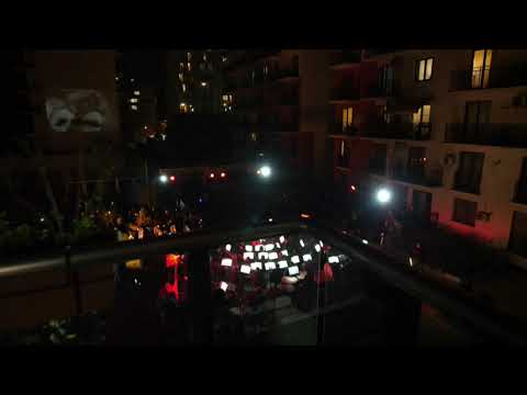 Georgian Philharmonic Orchestra perform in yard for beloved audience during lockdown