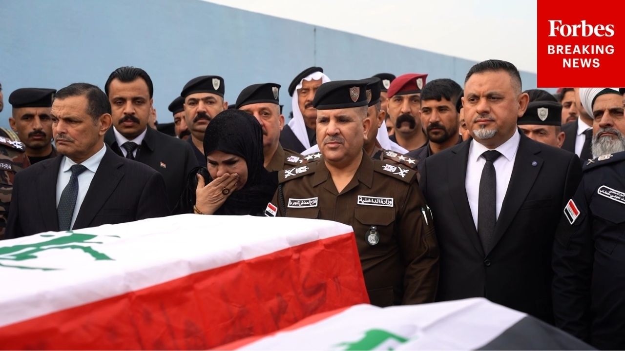 Iraqi Citizens Hold Funeral For Two Police Officers Killed During Airstrike On Mosul, Iraq