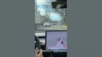 Tesla FSD Beta being awkward while interacting with oncoming car