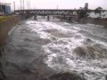 LA River half ways full of rain water.