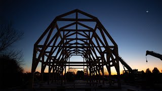 Raising a 64' x 152' Timber Frame Gambrel-Style Event Barn in Iowa