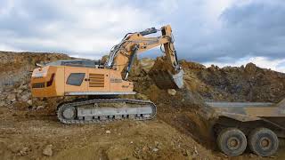 Liebherr 966 loading 745C and A30G