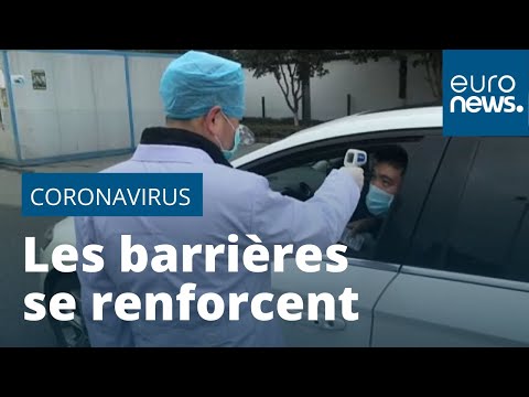 Coronavirus chinois: le bilan s'alourdit, les barrières se renforcent Coronavirus chinois: le bilan s'alourdit, les barrières se renforcent