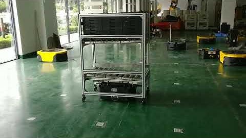 103 small Elfin QR code navigation AGV carries a trolley test in house
