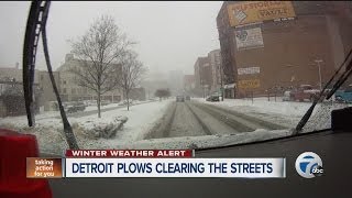 Detroit plows clearing the streets