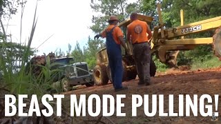 Peterbilt log truck in the ditch Serious Power rolling coal!