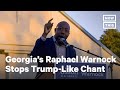 Rev. Raphael Warnock Shuts Down 'Lock Him Up' Chant | NowThis