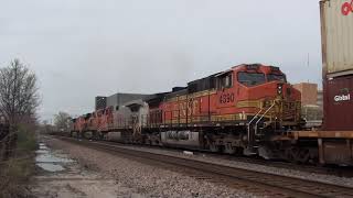 BNSF #5540 leads WB 2x4x0 Stacktrain/Baretables with BNSF Warbonnet Mid DPU. Olathe, KS 4/10/21