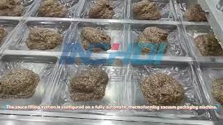 Fully automatic thermoforming vacuum packaging machine is integrated with a sauce filling unit.