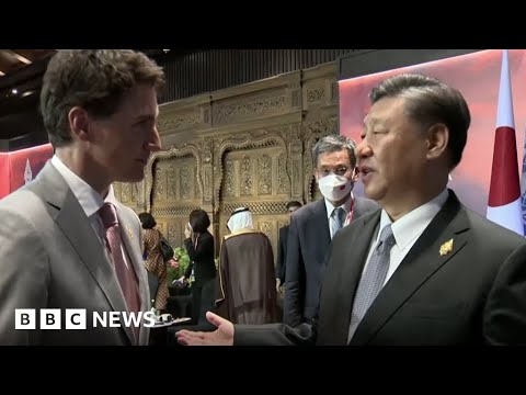 China and Canada leaders caught having tense exchange on camera – BBC News