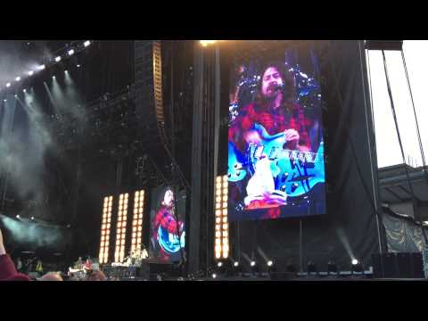 Dave Grohl back on stage after breaking his leg after falling of stage - explaining why