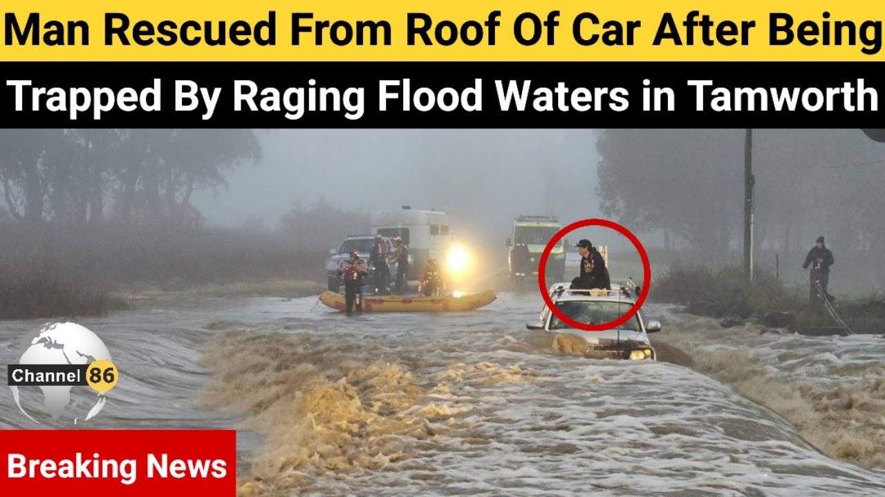 Man rescued from roof of car after being trapped by raging flood waters ...