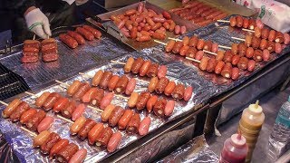 Korea Street Food. Sausages and Octopus Skewers in Myeongdong, Seoul