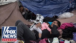 First members of migrant caravan begin applying for asylum