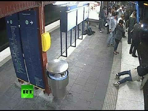 Shock CCTV: Man falls onto tracks, gets robbed and run over by train