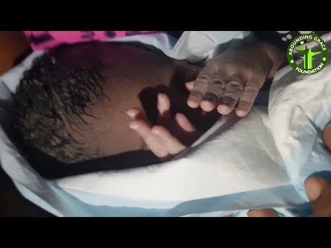 New Baby born in an unpredicted circumstances, saved from a flooded home in Lagos