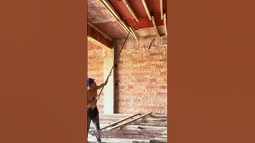 Demolition Genius: Removing Wooden Strips from Concrete Ceiling with Metal Hook!