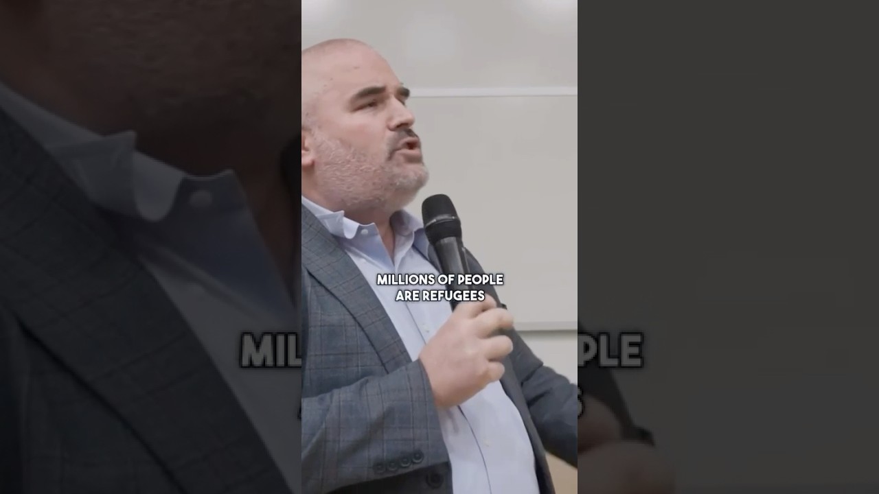 Haviv Gur SHUT DOWN Interrupting Masked Protestor